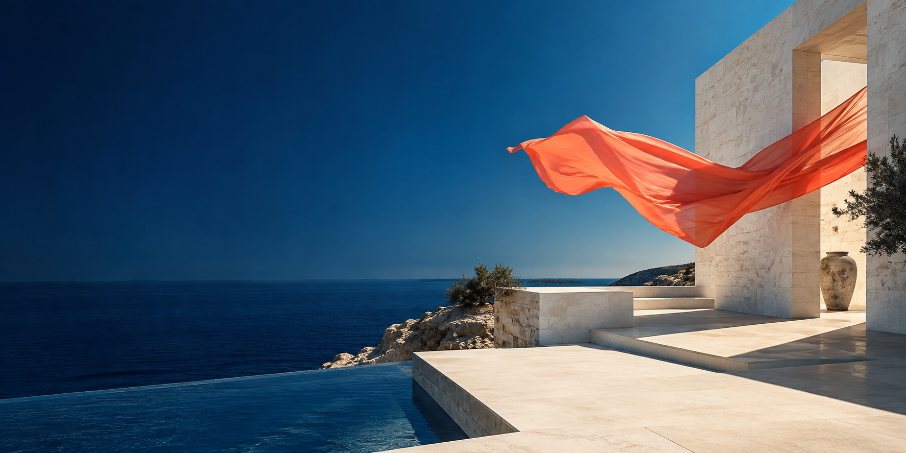 Mediterranean architecture beside the sea with a flowing coral fabric